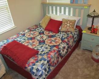 Full-Size Bed w/ Mattress set by HART FURNITURE. And look at that cute comforter.