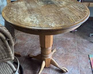 Round Oak Pedestal Dining Table with Claw Feet