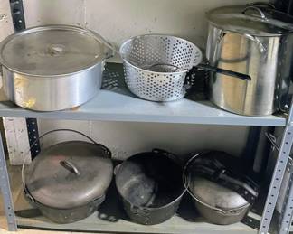 Cast iron dutch ovens, #8 Wagner, #10 and another #8.