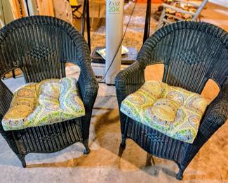 Dark green wicker chairs