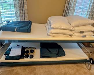 Like new Two stackable Cots, extra risers, storage bags, mattresses & pillows - very little use