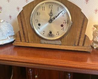Antique clock, 1938, with silver inscription, needs work.
