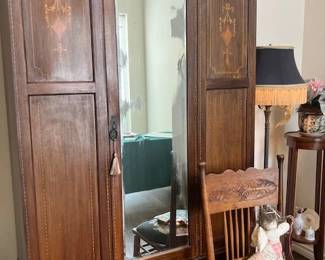 Antique arts and crafts armoire, side table with needlepoint seat.