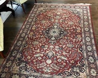 Hand knotted tribal rug