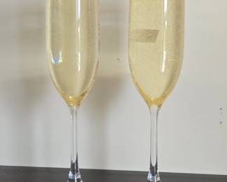 Artificial White Roses in Glass Vase and Two Champagne Flutes second image