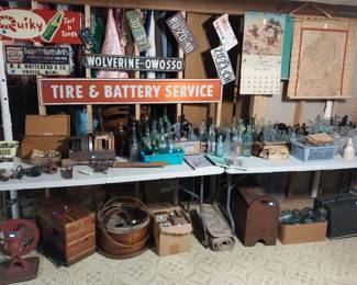 Quicky, tins and bottles, Wolverine Sign Co sign, license plates, vintage bottles, glass insulators