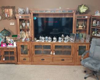 entertainment center, office chairbeer steins, Tiffany style lamp, decor