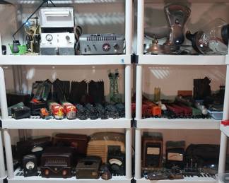 vintage radios, volt meters, telegraph keys, O scale trains, Orange Crush container, glass insulators, food scale
