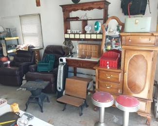 red leather recliners, ice cream stools, vintage vanity dresser, Little Joe 28 wood stove, fans