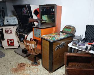 M&S 7UP drink cooler, Magnavox VHS movie maker, Sega Saturn, Original Nintendo, Kentucky Derby arcade game (not working), Rifle Champ shooting game (working), Speedway arcade game (working) 