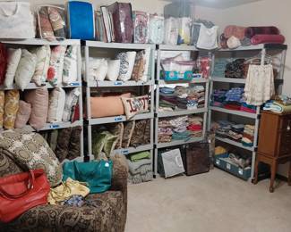 bedding, décor pillows, recliner, jewelry cbainet, Coach purses, Vera Bradley purse
