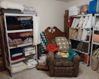 bedding, pillows, recliner, Coach purses, Vera Bradley purse