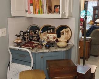 stools, Grecian style pottery, cook books, mugs