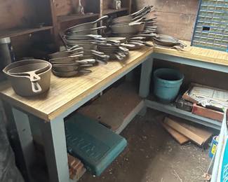 Several cast iron skillets