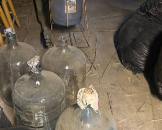 Several water bottles, one with stand