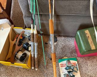 Vintage 2 Heddon rods and reels