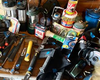 Camping lanterns, axes, knives, kettle
