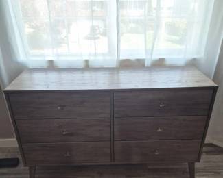 Six‑Drawer Wood‑Grain Laminate Dresser