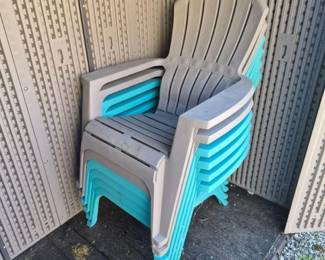 Six Plastic Adirondack Style Outdoor Chairs