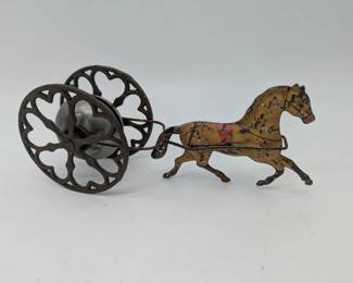 Tin toy bell noisemaker with iron wheels