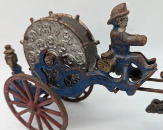 Cast-iron toy firehouse wheel horse drawn with driver