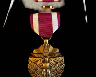 VINTAGE UNITED STATES OF AMERICA MERITORIOUS SERVICE MEDAL AND RIBBON
