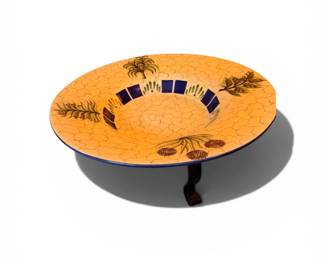 Decorative ceramic bowl on stand