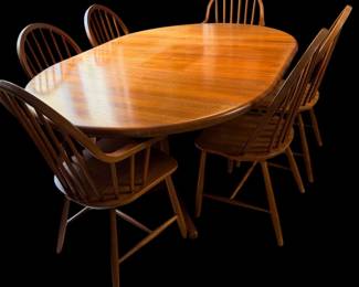 Teak dining table with six chairs/leaves