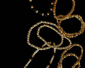 Lots of costume jewelry.  Bracelets, necklaces. Earrings and pins.