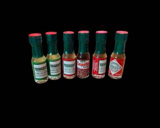 Six miniature Tabasco bottles