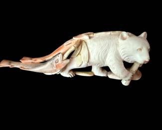 Carved bear with rainbow trout 