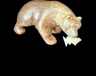 Douglas Creek Sculpture Co. BEAR WALKING WITH FISH      fish carved from horn harvested by the artist Wendy Hook. The bear is soapstone. 