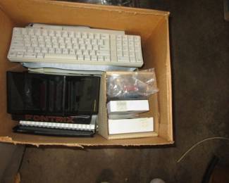 Room full of accessories for computers, software, keyboards etc