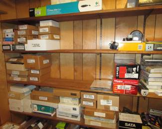 Room full of accessories for computers, software, keyboards etc