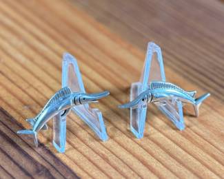 This lot features a pair of vintage sterling silver earrings depicting swordfish.