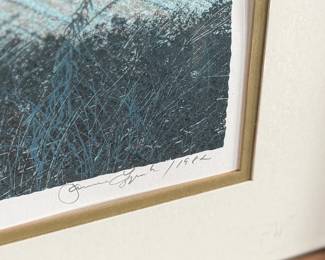 “Across the Meadow”, an original lithograph by listed artist, James Lynch. Signed lower right, professionally framed, and measures in frame, 22” H x 25.5” W. Certificate of authenticity on the verso. James Lynch (b. 1956) grew up in Wiltshire and now lives and works in Somerset. His work is included in the National Trust collections at Kingston Lacy, Wimpole Hall, and Chartwell. Awards include; the Elizabeth Greenshields bursary (83′), the Royal Academy Award for watercolour (86′) and the Spectator Art Award (93′).