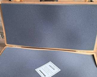 Wooden display case by Health Edco/WRS, containing educational models on the consequences of drug abuse. Case includes realistic anatomical representations of organ damage, such as brain infection, heart infection, vein damage, and birth defects. Accompanied by a ‘Substance Abuse Identification Guide’ and foam padding for storage. Case is equipped with clasps and a black handle. Exterior shows scratches and wear. Measures (closed), 27.75” H x 14” W.