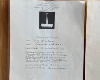 “City of Gold”, a limited edition print by listed artist, Marcia Isaacs and printed by Master Printer, Bill Wheeler. Edition 43/150, titled, and signed lower right by the artist. Certificate of authenticity and bio on the verso. Measures in frame, 26.5” H x 23.25” W. Isaacs has dabbled in etchings, monotypes, mixed media, collages, paintings, and digital imagery. Marcia Isaacs attended UC Berkeley, obtained her BA in Art from UCLA (University of California Los Angeles) and her Masters of Art from CSUN (California State University Northridge).