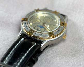 This lot features an Elgin FS-408 Calendar Moon Phase Quartz watch on a genuine leather band. Will need a new battery at minimum.