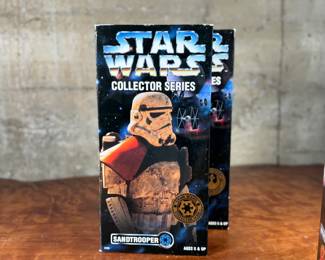 Five (5) Star Wars Collector Series action figures in their original packaging, featuring Luke Skywalker, Princess Leia, Darth Vader, and others. Each figure includes detailed outfits and accessories. Packaging shows minor wear consistent with age and storage.