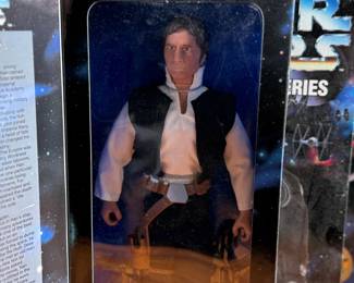 Five (5) Star Wars Collector Series action figures in their original packaging, featuring Han Solo, Greedo, Admiral Ackbar, and others. Each figure includes detailed outfits and accessories. Packaging shows minor wear consistent with age and storage.