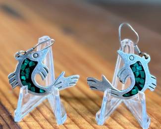 This lot features a pair of stunning vintage Taxco silver "fish" earrings with inlaid malachite.