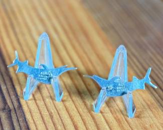 This lot features a pair of vintage sterling silver earrings depicting swordfish.