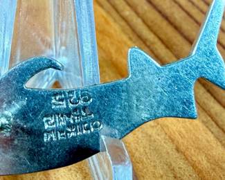 This lot features a pair of vintage sterling silver earrings depicting swordfish.