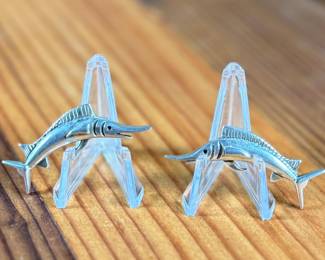 This lot features a pair of vintage sterling silver earrings depicting swordfish.