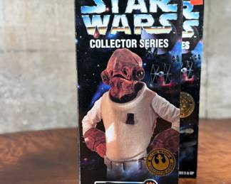 Five (5) Star Wars Collector Series action figures in their original packaging, featuring Han Solo, Greedo, Admiral Ackbar, and others. Each figure includes detailed outfits and accessories. Packaging shows minor wear consistent with age and storage.