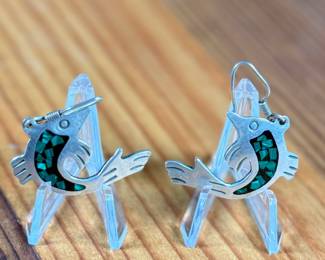 This lot features a pair of stunning vintage Taxco silver "fish" earrings with inlaid malachite.