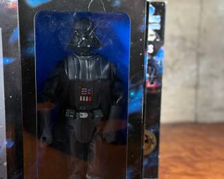 Five (5) Star Wars Collector Series action figures in their original packaging, featuring Luke Skywalker, Princess Leia, Darth Vader, and others. Each figure includes detailed outfits and accessories. Packaging shows minor wear consistent with age and storage.