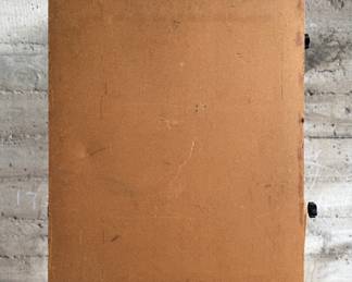 Media artwork on board depicting a skull wearing a hat with ‘100 Outlaw’ written on it. The piece features dark tones accented with striking yellow highlights. There is a gun and a bird incorporated into the imagery. The frame has wear at the edges, and the artist’s signature is present in the lower right corner. Mounted without glass covering and measures, 30” H x 24” W.