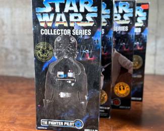 Five (5) Star Wars Collector Series action figures in their original packaging, featuring Han Solo, Greedo, Admiral Ackbar, and others. Each figure includes detailed outfits and accessories. Packaging shows minor wear consistent with age and storage.